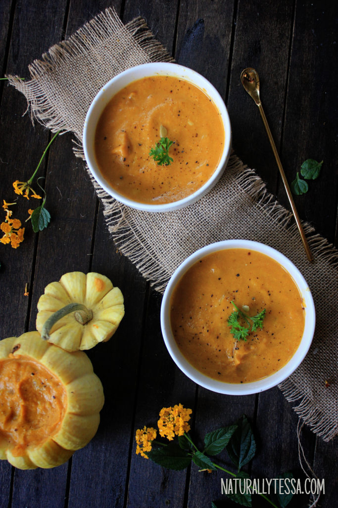 7-Ingredient homemade pumpkin soap on a dark wooden table and mini pumpkins